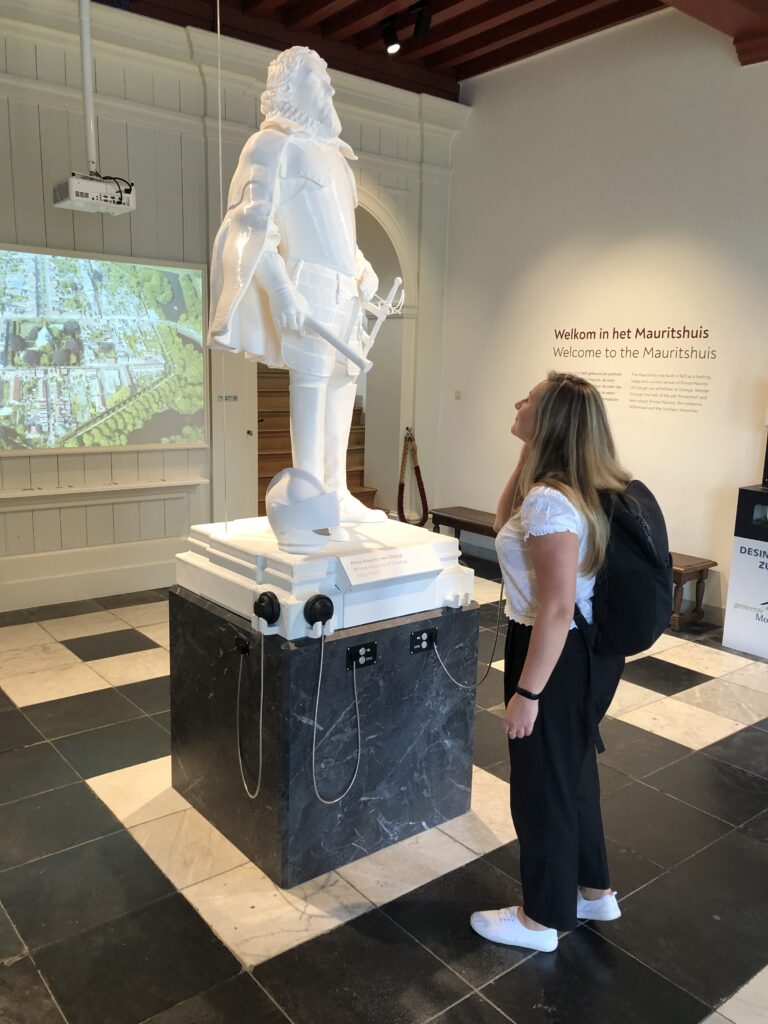 Paulina Oliwia Chodura (the 3d artist) and the statue she modeled